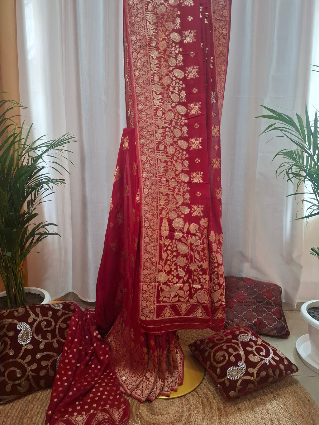 Deep red georgette Banarasi saree with zari flower and zari booti