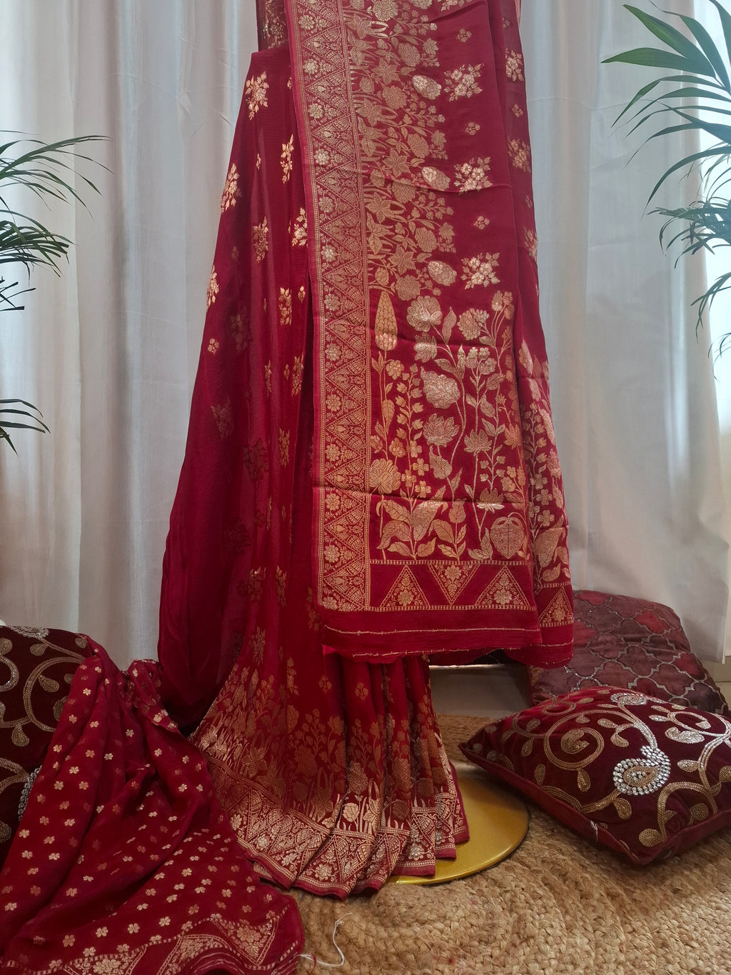 Deep red georgette Banarasi saree with zari flower and zari booti