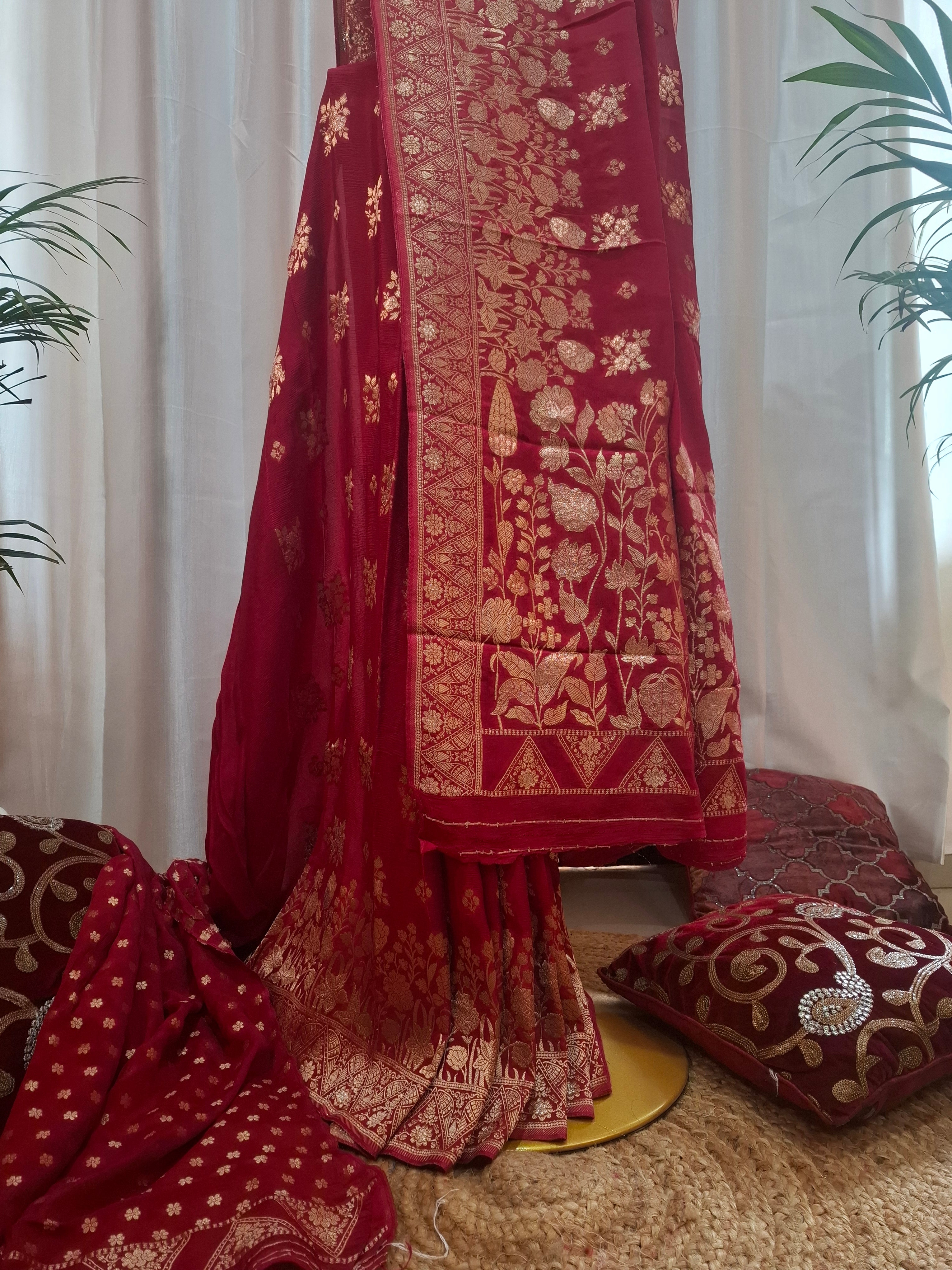 Deep red georgette Banarasi saree with zari flower and zari booti