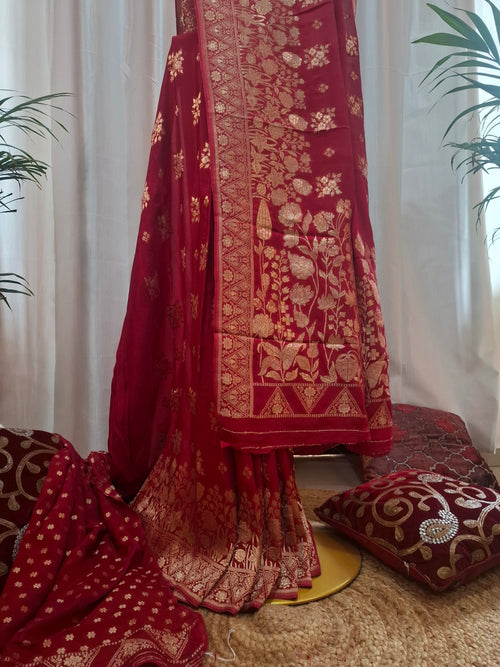 Deep red georgette Banarasi saree with zari flower and zari booti