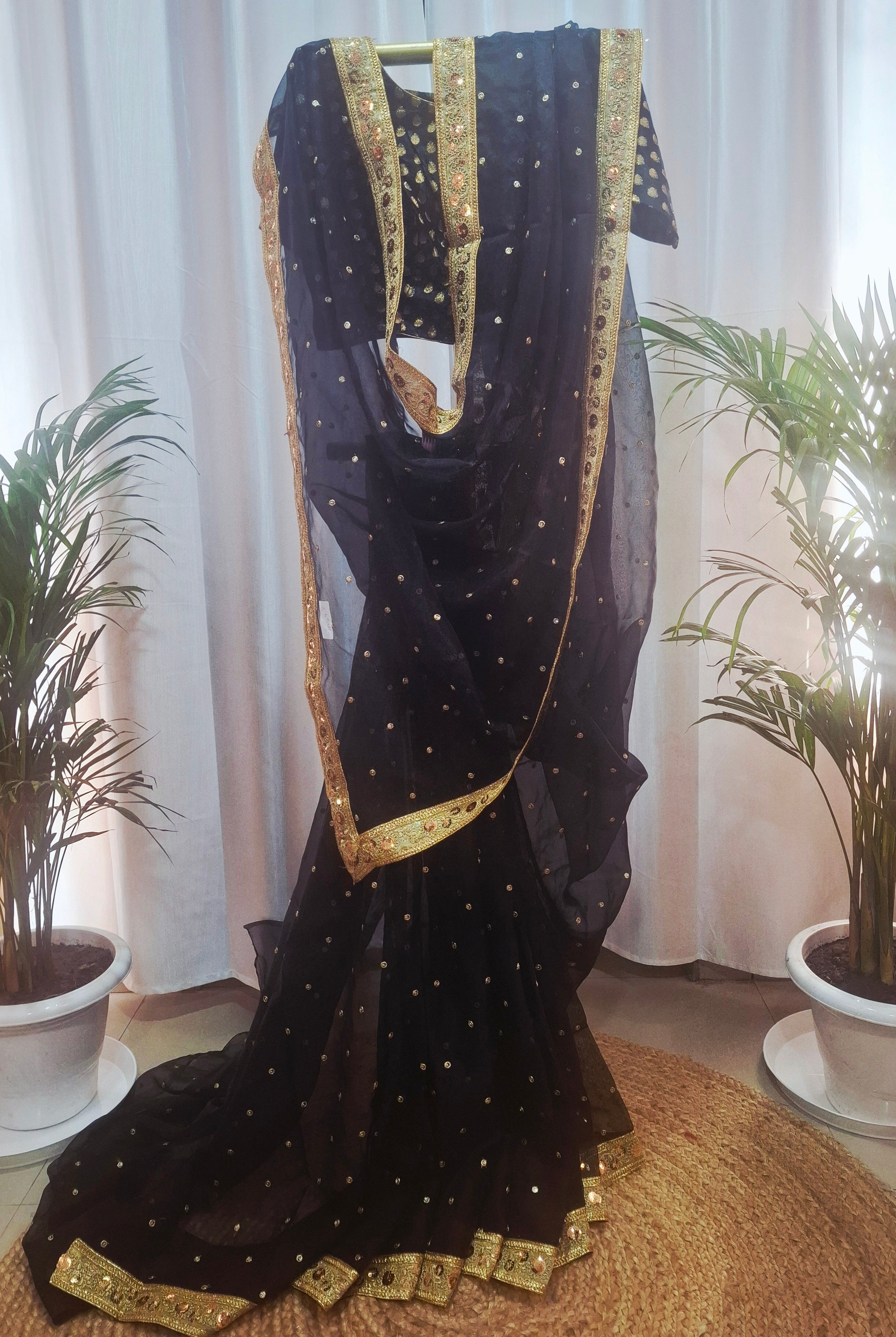 Black soft organza with golden booti ready to wear saree