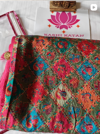 Luxe Pashmina Silk pista green saree with kani weaving