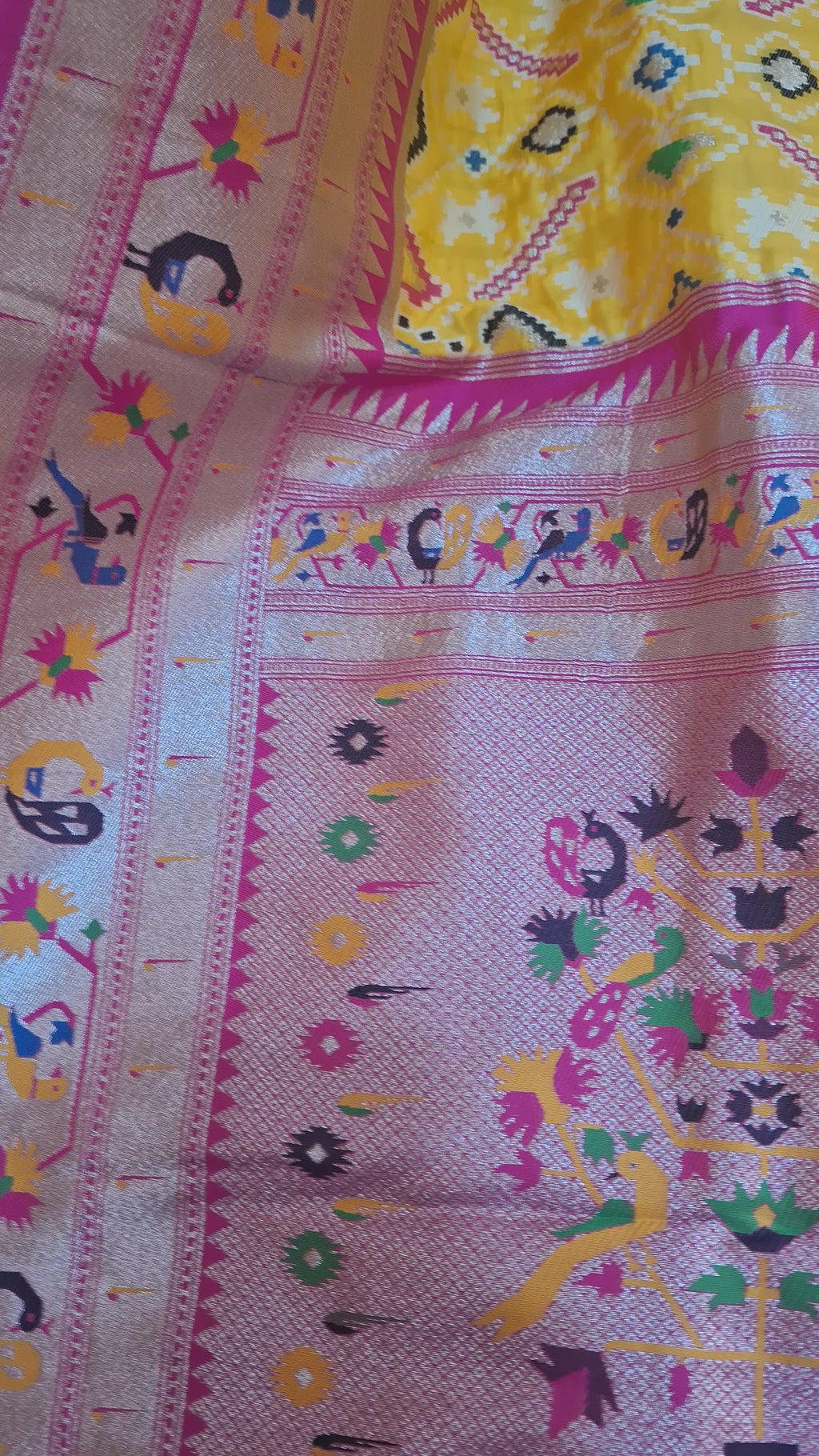 Mustard yellow patola silk saree with rani pink border