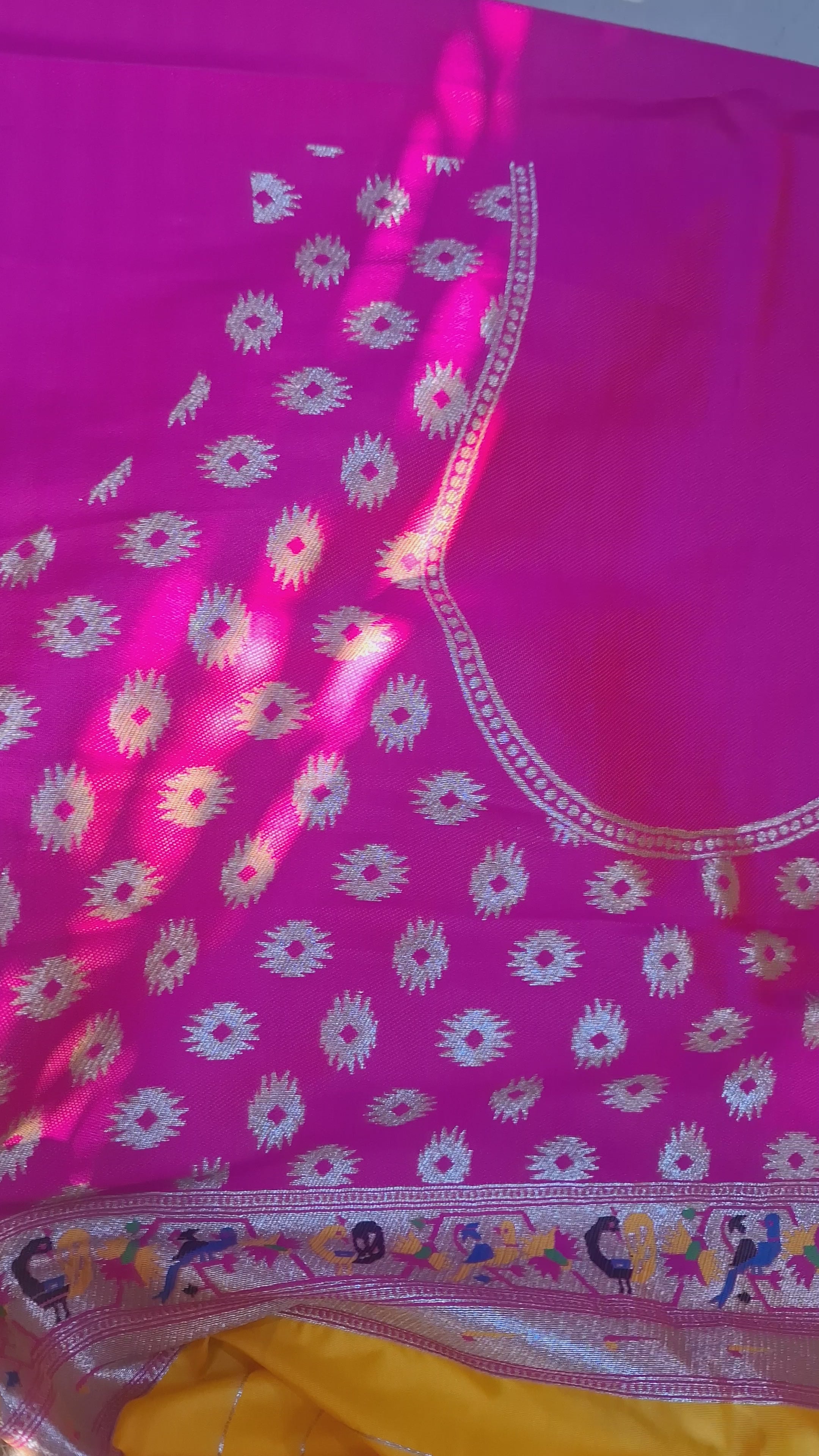 Mustard yellow patola silk saree with rani pink border